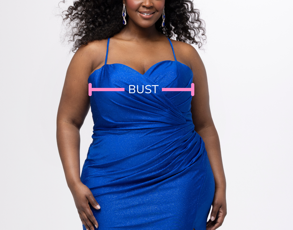 Woman wearing a blue dress with a measurement label on bust area against a white background.