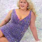 This is JK2402 in our collection Johnathan Kayne for Sydney's Closet. This plus size party dress comes in blue, periwinkle, and purple. This dress has bra friendly straps and a deep v-neckline. With all over sequins, this short fitted dress is going to shine and shimmer everywhere you go!