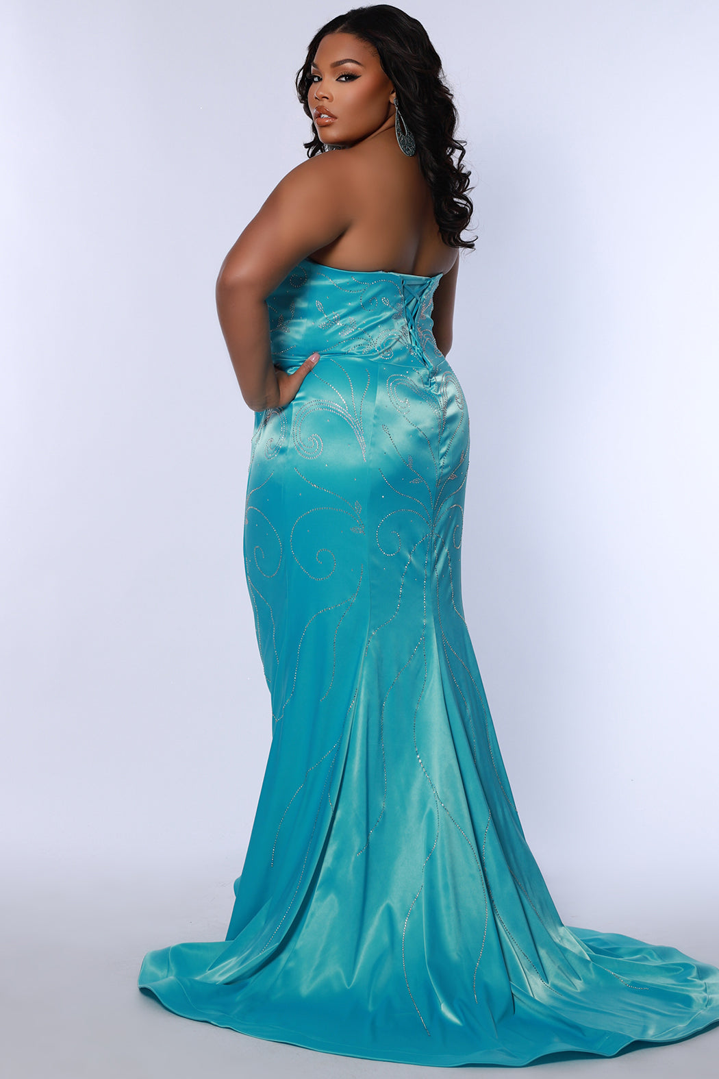 Stretch satin lycra plus size strapless  fitted mermaid gown with slit, lace-up back. Available in fuchsia pink or aqua blue. JK2509 from Johanthan Kayne for Sydney's Closet