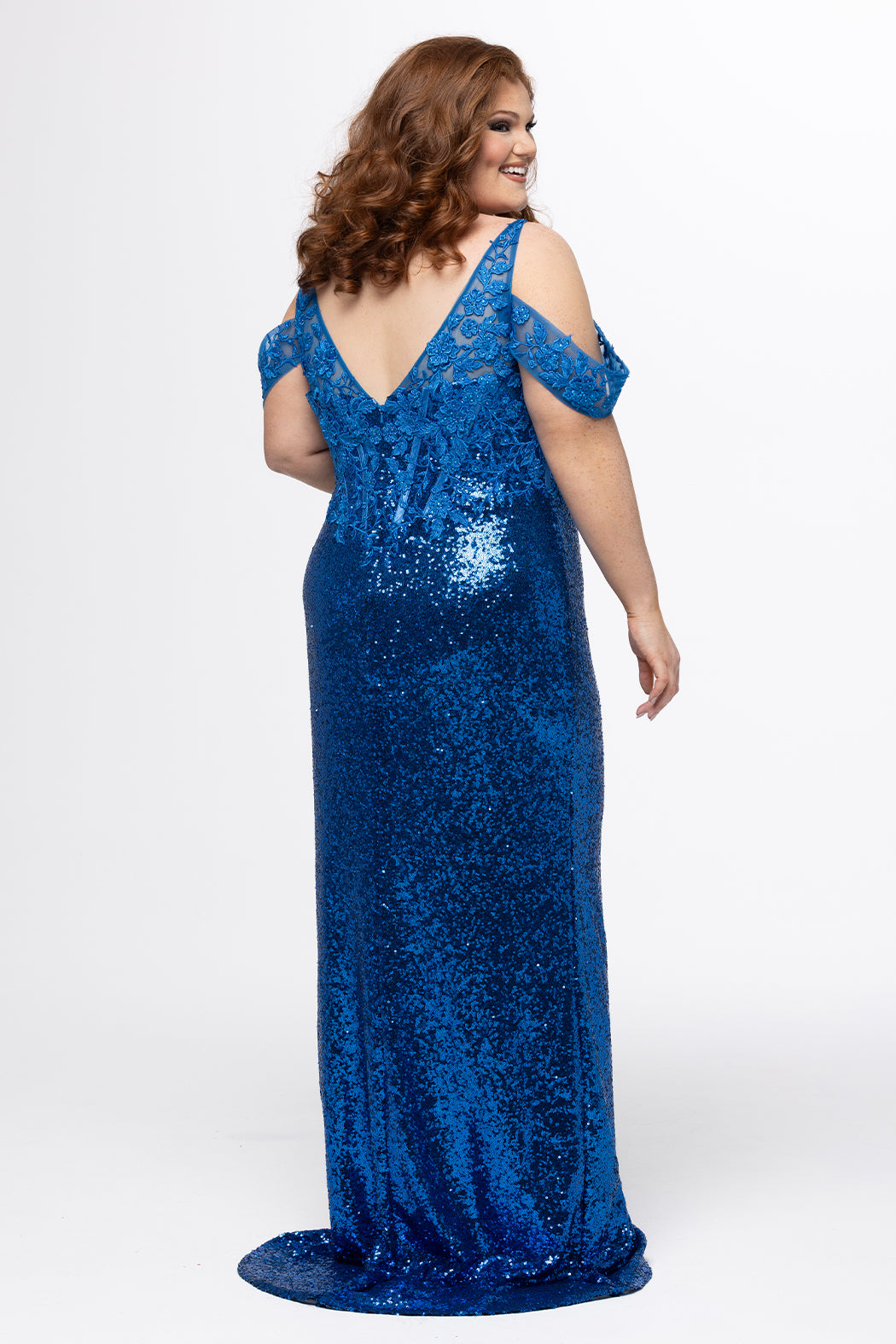 Johnathan Kayne for Sydney's Closet style JK2607 in blue. 

Slim fitted plus size floor length gown. Stretch sequin fabric with lace and exposed boning on bodice. One inch straps and optional drape off-the-shoulder straps. Left leg slit and long center back zipper. Available in sizes 10-28 in red, blue or black. 