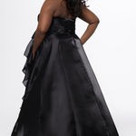 Johnathan Kayne for Sydney's Closet style JK2608.

Strapless sweetheart plus size A-line gown.  Ruched bodice with bow at natural waistline and flounce down left leg slit. Shiny organza fabric for lightweight comfort. Available in sizes  10-32 in Red, Black and Blue. 