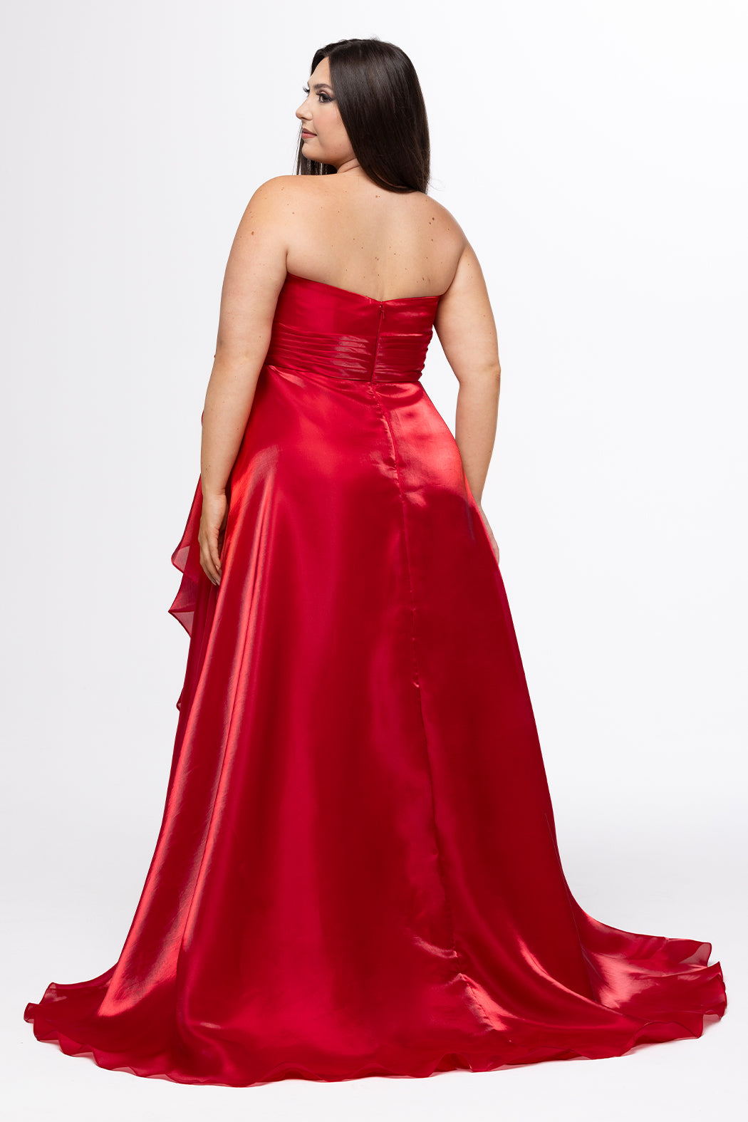 Johnathan Kayne for Sydney's Closet style JK2608.

Strapless sweetheart plus size A-line gown.  Ruched bodice with bow at natural waistline and flounce down left leg slit. Shiny organza fabric for lightweight comfort. Available in sizes  10-32 in Red, Black and Blue. 