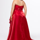 Johnathan Kayne for Sydney's Closet style JK2608.

Strapless sweetheart plus size A-line gown.  Ruched bodice with bow at natural waistline and flounce down left leg slit. Shiny organza fabric for lightweight comfort. Available in sizes  10-32 in Red, Black and Blue. 
