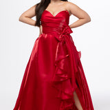 Johnathan Kayne for Sydney's Closet style JK2608.

Strapless sweetheart plus size A-line gown.  Ruched bodice with bow at natural waistline and flounce down left leg slit. Shiny organza fabric for lightweight comfort. Available in sizes  10-32 in Red, Black and Blue. 