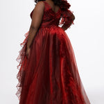 Johnathan Kayne for Sydney's Closet style JK2611. 

Plus size A-line gown made with multidimensional organza. Thick straps with detachable ruffle at shoulder. Ruched waistband with natural waistline and left leg slit with large ruffle. Deep v-neckline and center back zipper. Available in sizes 10-32 in purple and red. 