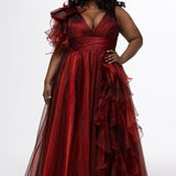 Johnathan Kayne for Sydney's Closet style JK2611. 

Plus size A-line gown made with multidimensional organza. Thick straps with detachable ruffle at shoulder. Ruched waistband with natural waistline and left leg slit with large ruffle. Deep v-neckline and center back zipper. Available in sizes 10-32 in purple and red. 