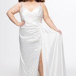 Johnathan Kayne for Sydney's Closet style JK2612. 

Plus size fitted satin gown. Braided beaded straps and V-neckline. Pleated bodice and ruched skirt with left leg slit and left side drape panel. Natural waistline and center back zipper. Available in sizes 10-24 in blue, black or white. 
