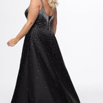 Johnathan Kayne for Sydney's Closet style JK2613. 

Plus size A-line gown with hot fix stones on thick satin fabric. Heavily embellished deep V-neckline with nude-mesh insert and embellished one inch straps. A-line skirt with left leg slit. Lace up back with modesty panel and half zipper. Available in sizes 10-32 in red, blue and black. 