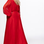 Johnathan Kayne for Sydney's Closet style JK2614. 

Plus size A-line chiffon gown with long bishop sleeves, beaded cuff and bicep slit. Bra-friendly straps, v-neckline and pleated bodice. Natural waistline with 4 inch beaded, rhinestone and sequin embellished waistband. Pockets, left leg slit with zipper, v-back and center back zipper. Available in sizes 10-32 in black, blue and red. 