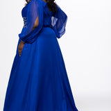 Johnathan Kayne for Sydney's Closet style JK2614. 

Plus size A-line chiffon gown with long bishop sleeves, beaded cuff and bicep slit. Bra-friendly straps, v-neckline and pleated bodice. Natural waistline with 4 inch beaded, rhinestone and sequin embellished waistband. Pockets, left leg slit with zipper, v-back and center back zipper. Available in sizes 10-32 in black, blue and red. 