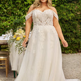 Michelle Bridal MB2413 Ivory. Floral lace appliques with bugle beads and clear sequins, Soft bridal tulle,  Organza, Satin, horsehair hem, A-line, Sweetheart neckline, exposed corset boning, Strapless, Off the shoulder drape sleeves, Bodice unlined, Nude cups included, Optional finished bodice included, Natural waistline, Long invisible center back zipper.