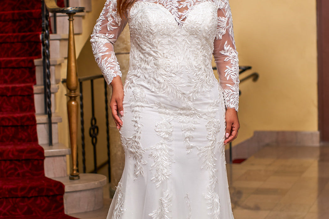 Michelle Bridal MB2423 Ivory. lace covered sleeves, Keyhole back ,Leaf and floral embroidered appliques on net, Soft bridal tulle, Sparkle tulle, Light satin lining, Light lining, Clear sequins, bugle beads, cut glass, Fitted silhouette, sweetheart neckline, lace covered illusion.