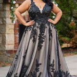 Plus size A-line oversized floral weding dress in black, ivory or champagne. Style MB2525 from Michelle Bridal by Sydney's Closet has illusions straps covered in appliques, natural waisltine, long flowy A-line skirt and long train with covered buttons. 