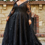 MB2604 by Michelle Bridal

Available in Black, Ivory, Black on Ivory, Ivory on Black, Ivory on Champagne and Black on Champagne. 

Plus-size model wearing a black A-line wedding gown with sheer long sleeves, a deep V-neckline, and intricate lace appliqué with subtle shimmer throughout the full skirt, photographed outdoors in front of a stone backdrop.