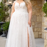 Michelle Bridal MB2613 shown in Rosewater. 
Beaded double spaghetti straps, v-neckline, natural waistline. 3D floral appliques, soft bridal tulle, satin lining. A-Line skirt with left leg slit. Scoop back and center back zipper. 