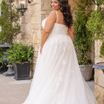 Michelle Bridal MB2617 shown in Ivory. 

Spaghetti straps, v-neckline, natural waistline. Floral appliques, soft bridal tulle, lightweight satin lining. Ballgown skirt with appliques detail. Long train, straight across back and center back zipper.  