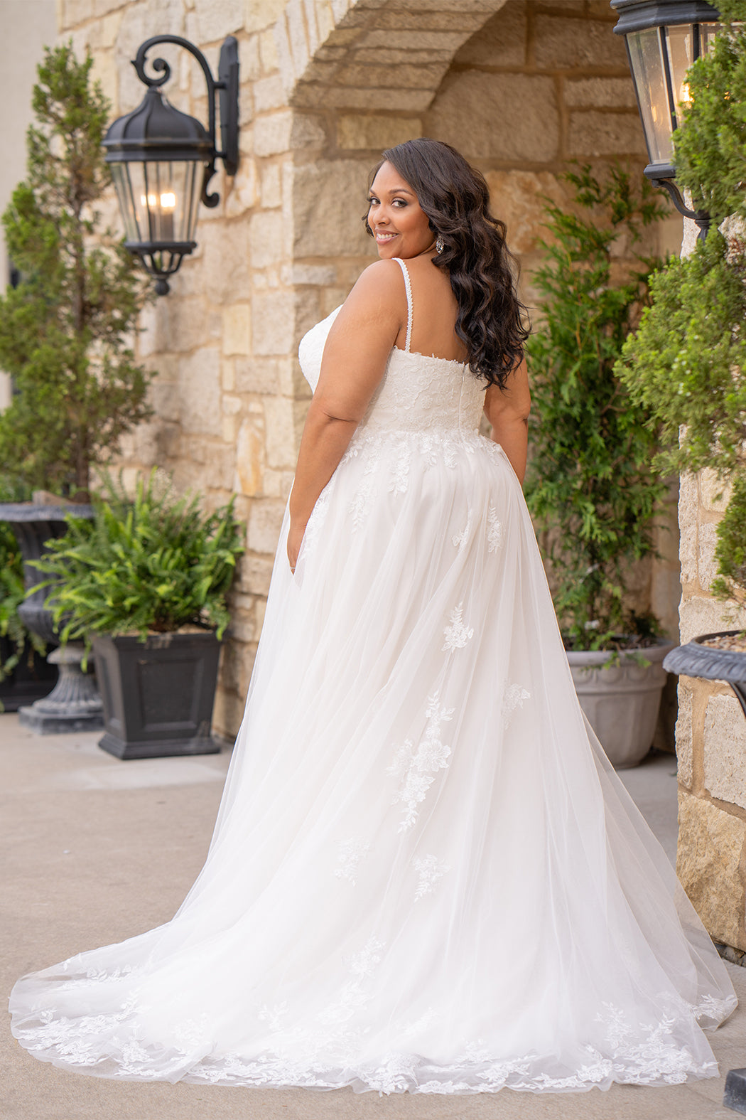 Michelle Bridal MB2617 shown in Ivory. 

Spaghetti straps, v-neckline, natural waistline. Floral appliques, soft bridal tulle, lightweight satin lining. Ballgown skirt with appliques detail. Long train, straight across back and center back zipper.  