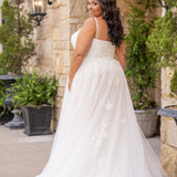 Michelle Bridal MB2617 shown in Ivory. 

Spaghetti straps, v-neckline, natural waistline. Floral appliques, soft bridal tulle, lightweight satin lining. Ballgown skirt with appliques detail. Long train, straight across back and center back zipper.  