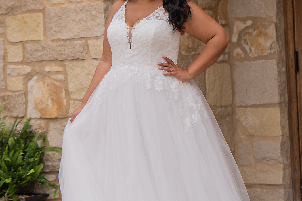 Michelle Bridal MB2617 shown in Ivory. 

Spaghetti straps, v-neckline, natural waistline. Floral appliques, soft bridal tulle, lightweight satin lining. Ballgown skirt with appliques detail. Long train, straight across back and center back zipper.  