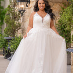 Michelle Bridal MB2617 shown in Ivory. 

Spaghetti straps, v-neckline, natural waistline. Floral appliques, soft bridal tulle, lightweight satin lining. Ballgown skirt with appliques detail. Long train, straight across back and center back zipper.  