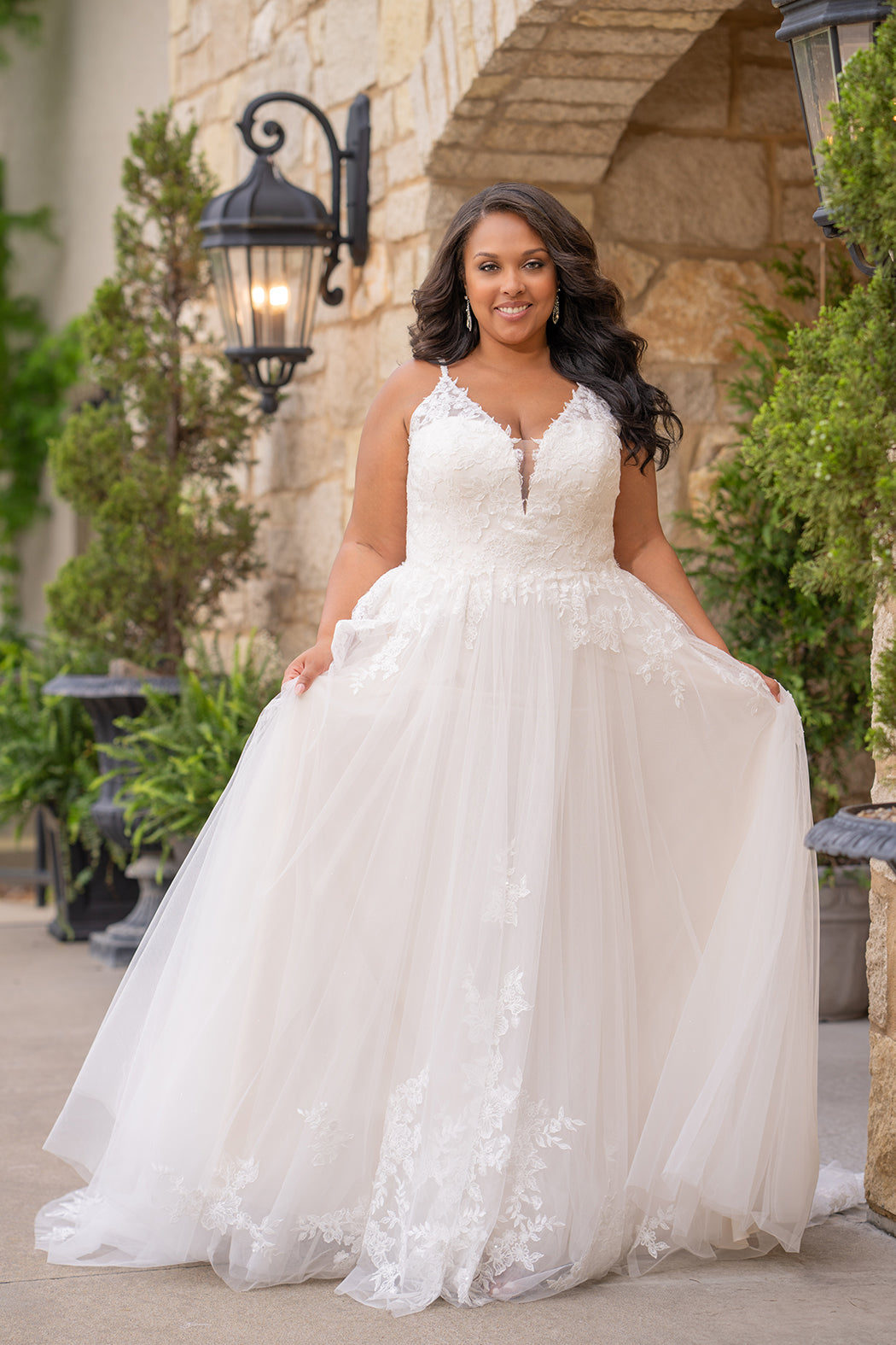Michelle Bridal MB2617 shown in Ivory. 

Spaghetti straps, v-neckline, natural waistline. Floral appliques, soft bridal tulle, lightweight satin lining. Ballgown skirt with appliques detail. Long train, straight across back and center back zipper.  
