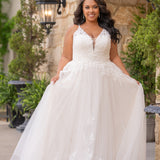 Michelle Bridal MB2617 shown in Ivory. 

Spaghetti straps, v-neckline, natural waistline. Floral appliques, soft bridal tulle, lightweight satin lining. Ballgown skirt with appliques detail. Long train, straight across back and center back zipper.  