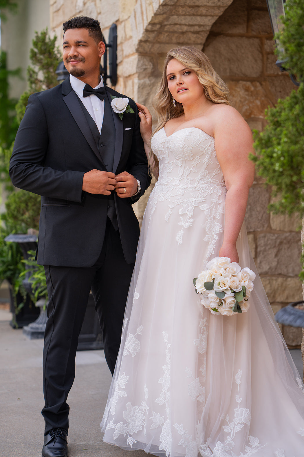 Michelle Bridal MB2618 shown in Latte. 

Strapless sweetheart ballgown. Soft bridal tulle, floral lace appliques, lightweight satin lining. Natural waistline, A-Line skirt. Bicep optional puff sleeves. Straight across back, center back zipper, train and covered buttons. 
