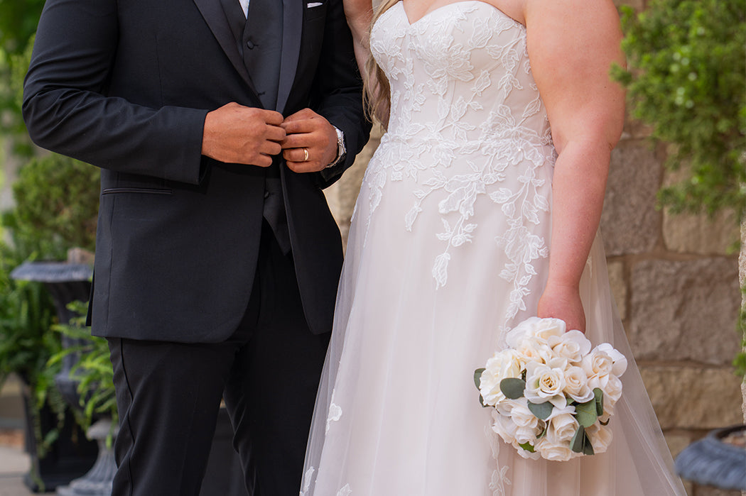 Michelle Bridal MB2618 shown in Sand. 

Strapless sweetheart ballgown. Soft bridal tulle, floral lace appliques, lightweight satin lining. Natural waistline, A-Line skirt. Bicep optional puff sleeves. Straight across back, center back zipper, train and covered buttons. 