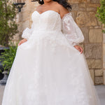Michelle Bridal MB2618 shown in Ivory. 

Strapless sweetheart ballgown. Soft bridal tulle, floral lace appliques, lightweight satin lining. Natural waistline, A-Line skirt. Bicep optional puff sleeves. Straight across back, center back zipper, train and covered buttons. 