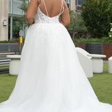 Michelle Bridal MB2620 shown in Ivory. 

Bridal ballgown with many layers of soft tulle and crinoline and satin lining. V-neckline, beaded straps, sheer bodice with floral appliques. Natural waistline and optional bodice lining. Long train and center back zipper. 