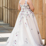 Michelle Bridal MB2622 shown in Floral Champagne. 

Ballgown with thick bra-friendly straps. V-neck, natural waistline, ballgown skirt, multi colored floral appliques, soft tulle and satin lining. Long train and center back zipper with covered buttons. 