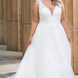 Michelle Bridal MB2622 shown in Ivory. 

Ballgown with thick bra-friendly straps. floral appliques, soft tulle and satin lining. Long train and center back zipper with covered buttons. 