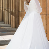 Sydney's Closet SC5320 ivory. Bridal chiffon, Satin lining, Silhouette: A-line, Neckline: V-neckline, Lightly pleated bodice, Bra-friendly straps, Long sleeves with cuff, Fully lined, Natural waistline, V-back, Long invisible center back zipper.