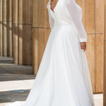 Sydney's Closet SC5320 ivory. Bridal chiffon, Satin lining, Silhouette: A-line, Neckline: V-neckline, Lightly pleated bodice, Bra-friendly straps, Long sleeves with cuff, Fully lined, Natural waistline, V-back, Long invisible center back zipper.