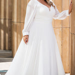 Sydney's Closet SC5320 ivory. Bridal chiffon, Satin lining, Silhouette: A-line, Neckline: V-neckline, Lightly pleated bodice, Bra-friendly straps, Long sleeves with cuff, Fully lined, Natural waistline, V-back, Long invisible center back zipper.