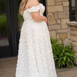 Plus size formal event dress or unique edgy wedding dress. 3D floral fabric. Scoop neckline with cat-eye detail, detachable drape sleeves, A-line skirt with pockets and train.  Sydney's Closet style SC7397 for formal gown or SC5354 for bridal gown is available in black or ivory. 