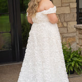 Plus size formal event dress or unique edgy wedding dress. 3D floral fabric. Scoop neckline with cat-eye detail, detachable drape sleeves, A-line skirt with pockets and train.  Sydney's Closet style SC7397 for formal gown or SC5354 for bridal gown is available in black or ivory. 