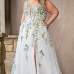 Sydney's Closet SC5371 plus size wedding dress.  Multi-colored floral lace on ivory tulle. Sexy plunging V-neckline with exposed corset boning.  Basque waistline on A-line skirt with slit and long train with lace details. Perfect for the unique, trendy bride.