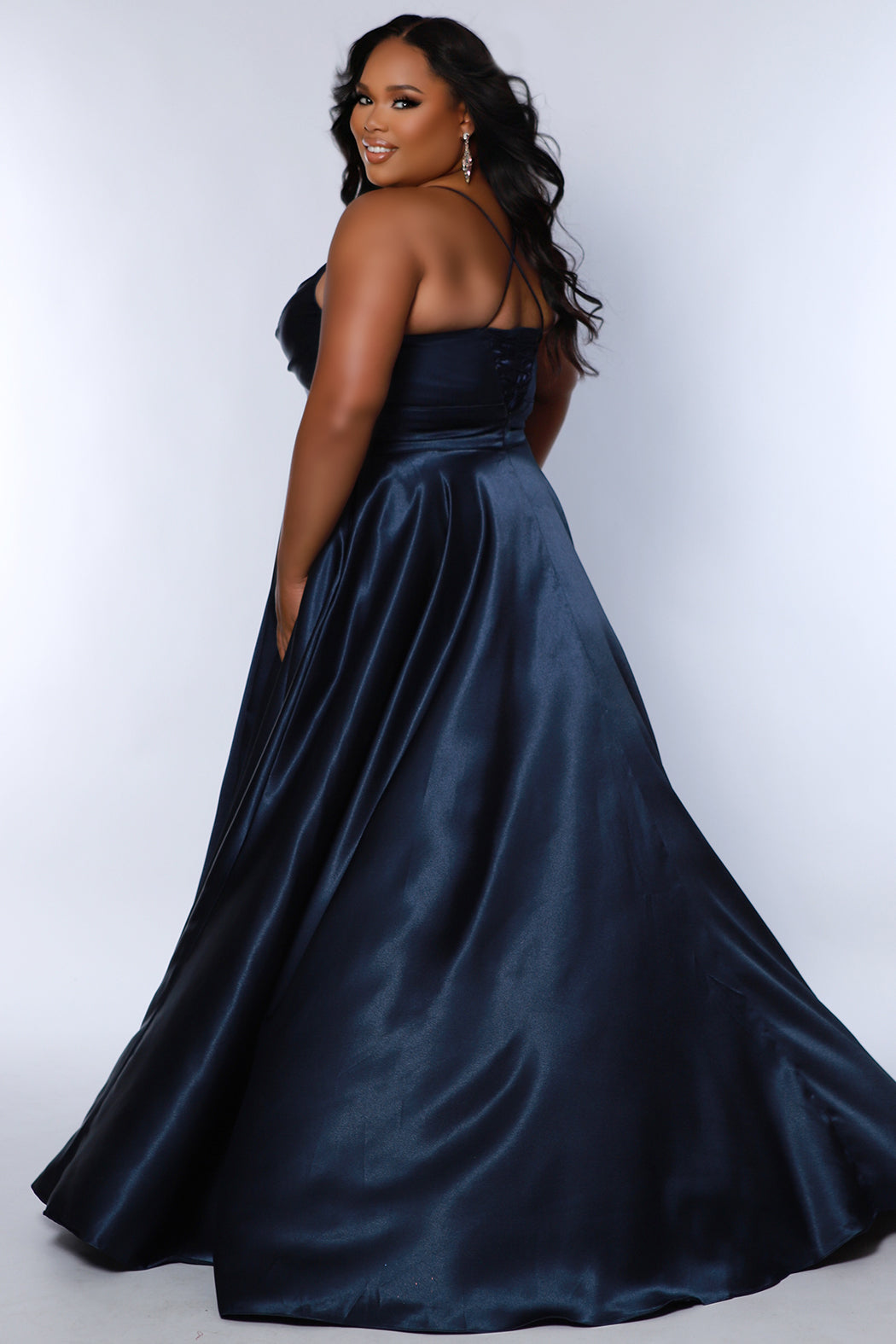 Sydney’s Closet SC7355 . Full A-line silhouette with a Sweetheart neckline and spaghetti straps. Has a lace up back, modesty panel and fully lined skirt with pockets and a slit. Offered in apricot orange, lemon yellow, lime green and raspberry pink. with new colors royal blue, navy blue and burgundy