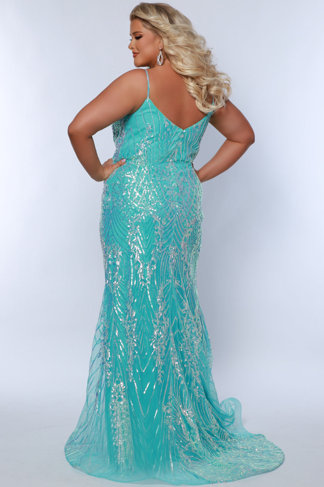 Sydney's Closet SC7366 Ocean. Fitted silhouette, Iridescent sequin on tulle over satin lining, Spaghetti straps, Sweetheart neckline, Slim trumpet skirt with sweep train, Fully lined
