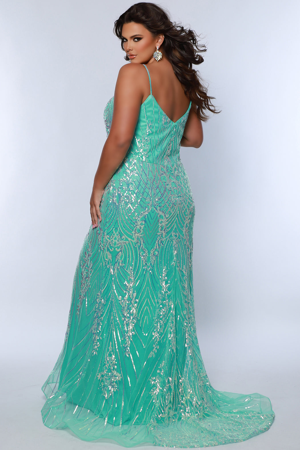 Sydney's Closet SC7366 Mint. Fitted silhouette, Iridescent sequin on tulle over satin lining, Spaghetti straps, Sweetheart neckline, Slim trumpet skirt with sweep train, Fully lined