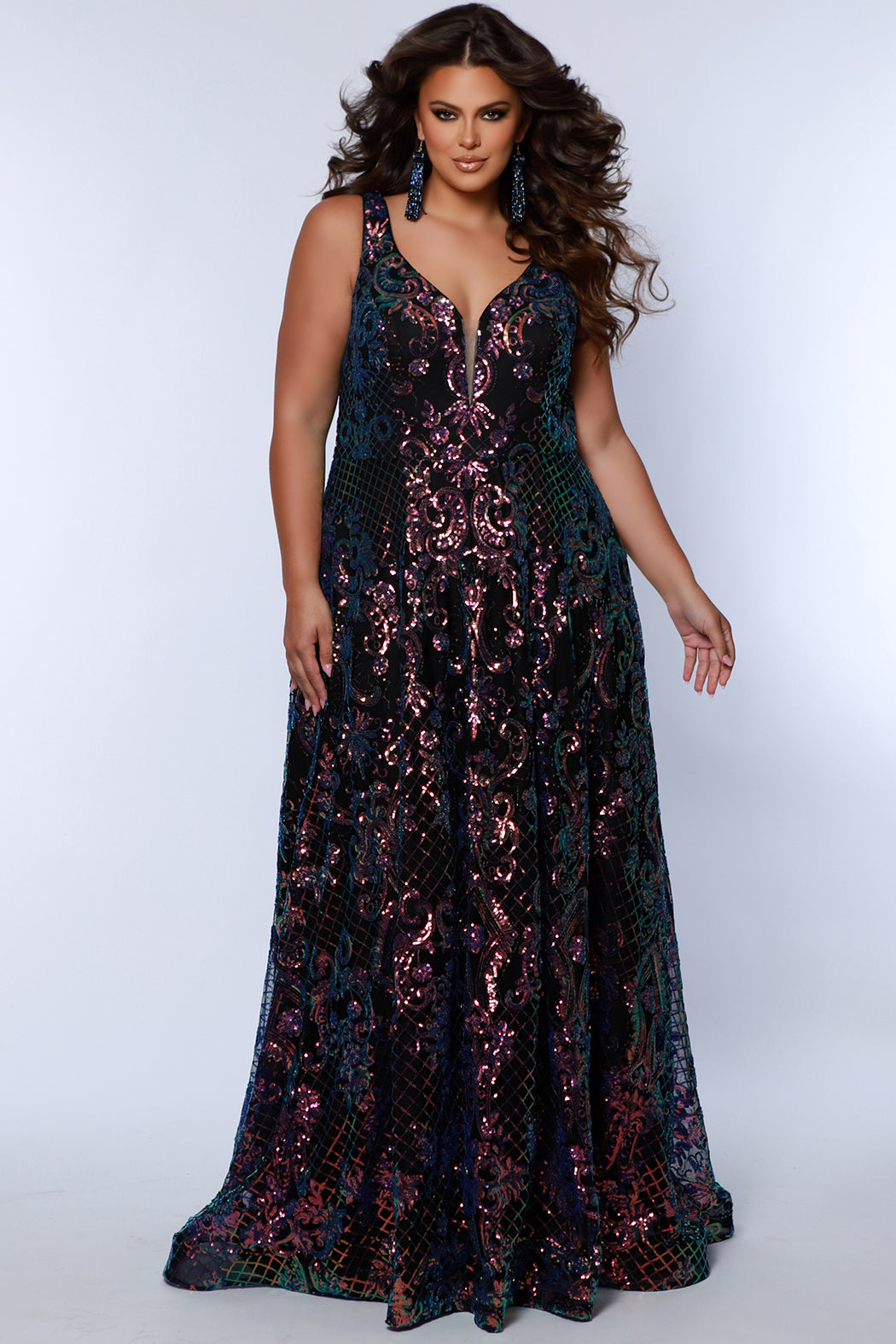 Sydney's Closet SC7367 Phoenix. Laser cut sequin on mesh, Stretch knit lining, A-line skirt, Pockets, V-neckline with nude mesh insert, Bra-friendly straps, Center back zipper, Sweep train, Horsehair hem.