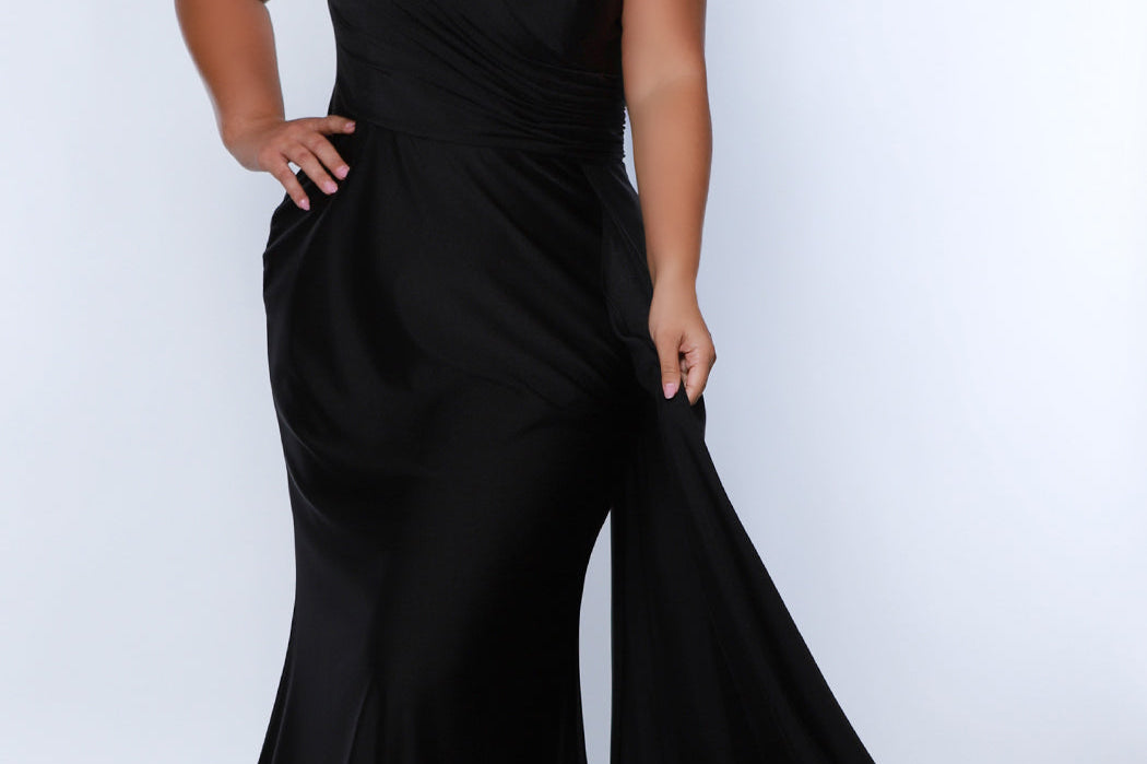 Sydney's Closet SC7377 Black. Stretch jersey over stretch knit lining, One-shoulder neckline, Ruched bodice, Natural waistline, Slim A-line skirt with train, Side fly away panel at waist, Long invisible center back zipper, Horsehair hem, Sweep train