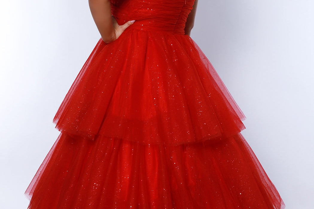 Sydney's Closet SC7392 Red. Tiered glitter tulle ballgown, pleated bodice, rolled satin straps covered in glitter tulle, natural waistline, center back zipper.