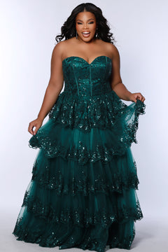 Strapless, sweetheart plus size gala formal ballgown. Exposed corset boning on bodice covered in lace applqiues. Tiered A-line skirt with matching lace applique hem. Style SC7398 is available in forest green, navy blue or burgundy red by Sydney's Closet. 