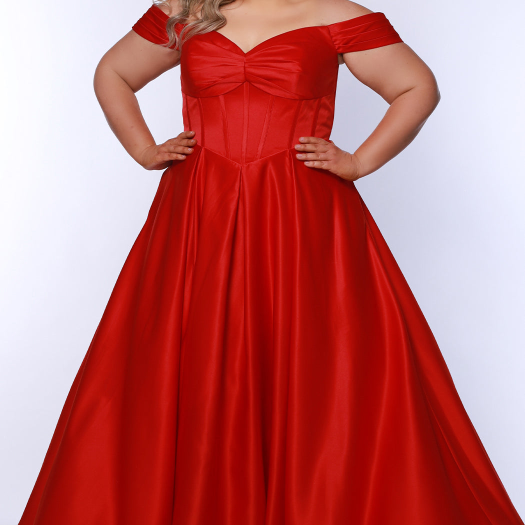 Long formal satin ballgown style SC7400 by Sydney's Closet. Available in sizes 14-32 in colors cobalt blue, onyx black and ruby red.  Pleated bodice with exposed boning, detachable pleated drape sleeves, basque waist and pockets.  
