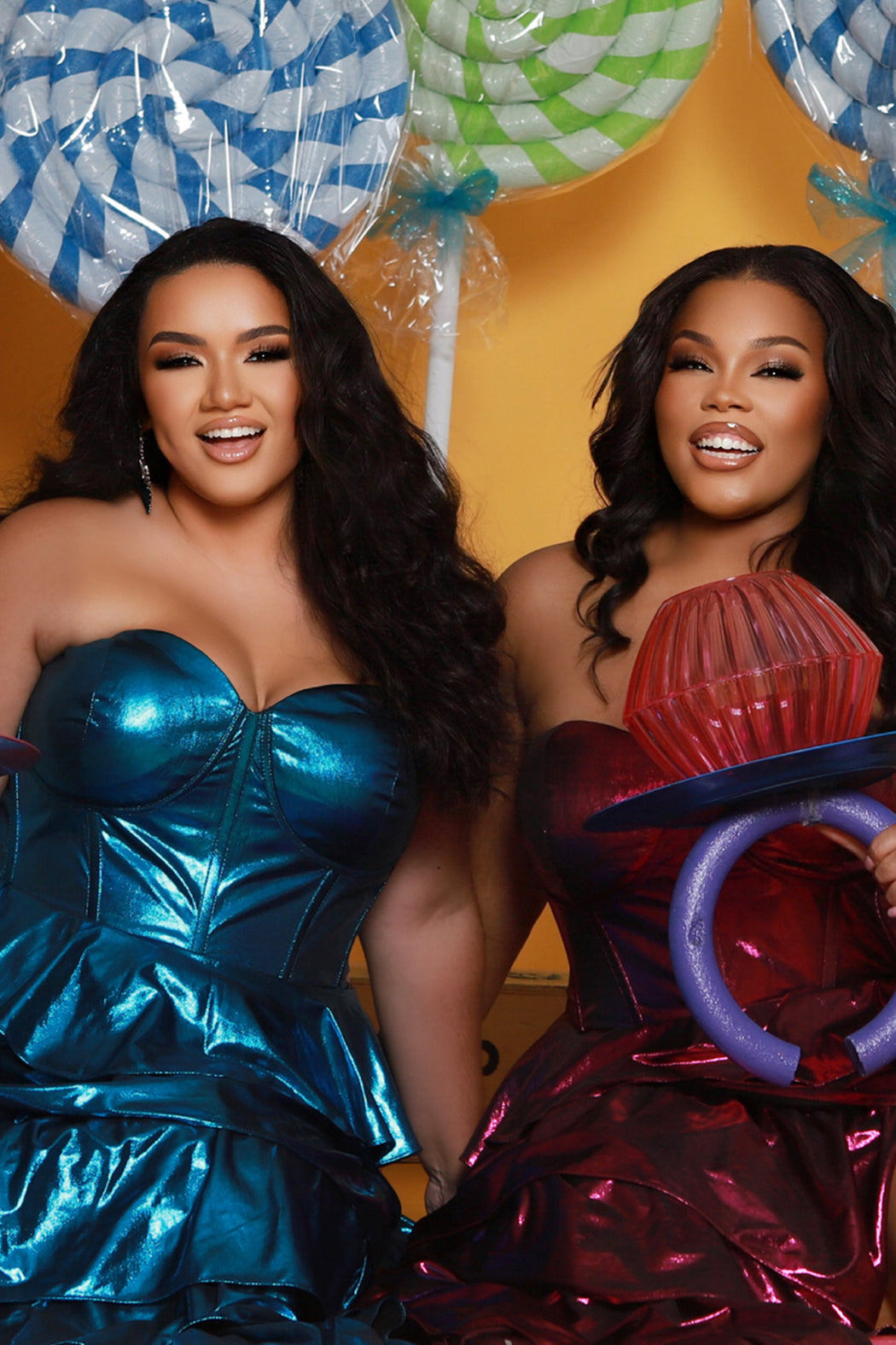 SC7405 by Sydney's Closet. Plus size strapless sweetheart metallic knit gown with exposed boning on bodice.  Tiered A-line skirt slit. Available in magenta pink, copper gold/brown and turq blue green.