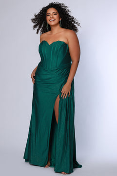 Sparkle stretch lycra plus size formal dress.  Strapless sweetheart neckline, basque waistline, exposed corset boning on bodice, ruchsed fitted skirt with high slit and zipper back. Available in sapphire blue, emerald green and onyx black. SC7412 by Sydney's Closet