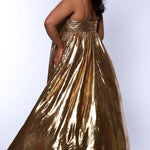 Empire plus size formal dress with spaghetti straps, pleated bodice with knot detail, pockets and slit. Available in gold, onyx black and ruby red. SC7414 by Sydney's Closet