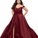 Plus Size Prom & Formal dress by Sydney's Closet - Style SC7431 shown in Burgundy Red. 

A-line silhouette, sweetheart neckline with pleated bust and knot details, detachable off the shoulder straps, natural waistline, A-line skirt with pocket and sexy slit with founce ruffle detail. 